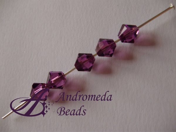 5 Cristalli Swarovski bicono 5328 6mm Amethyst - immagine 2