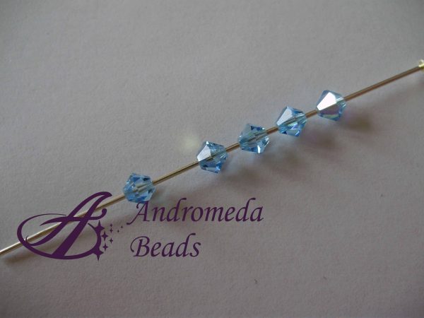 5 Cristalli Swarovski bicono 5328 6mm Aquamarine - immagine 2