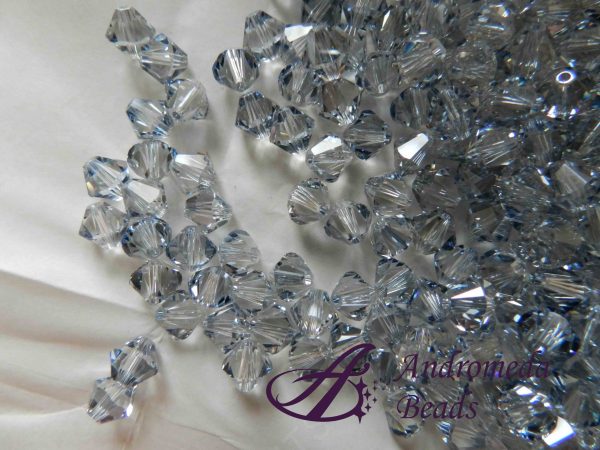 5 Cristalli Swarovski bicono 5328 6mm Blue Shade