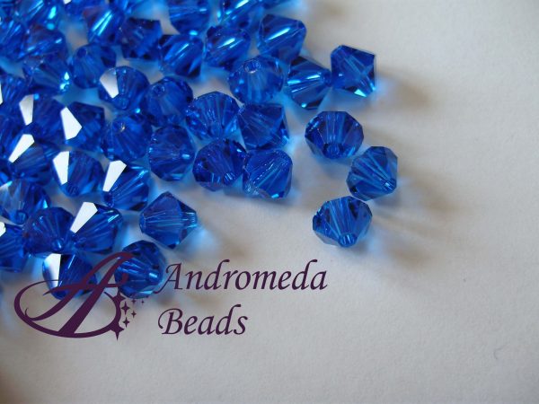 5 Cristalli Swarovski bicono 5328 6mm Capri Blue
