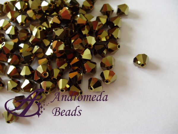 10 Cristalli Swarovski bicono 5328 4mm Dorado 2X