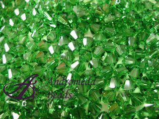 5 Cristalli Swarovski bicono 5328 6mm Fern Green