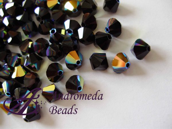 10 Cristalli Swarovski bicono 5328 4mm Jet AB