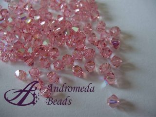 10 Cristalli Swarovski bicono 5301 4mm Light Rose AB