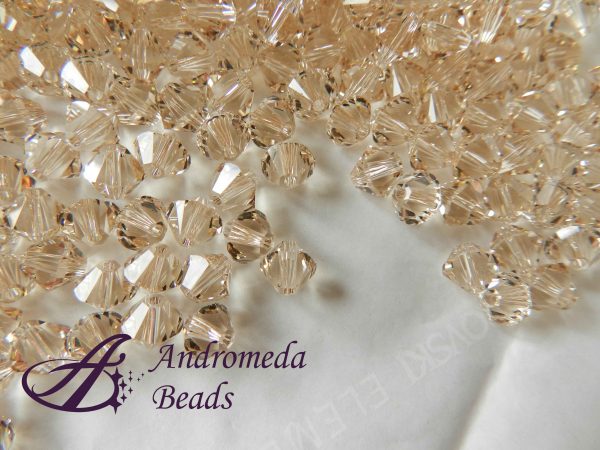 10 Cristalli Swarovski bicono 5328 4mm Light Silk