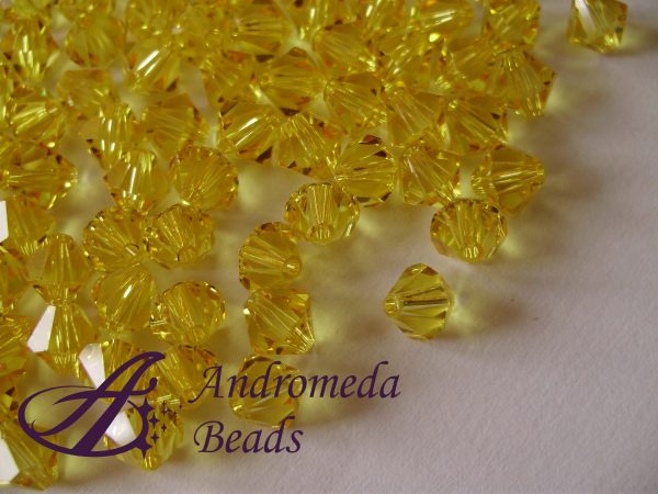 10 Cristalli Swarovski bicono 5301 4mm Light Topaz