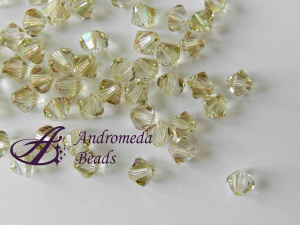 10 Cristalli Swarovski bicono 5328 4mm Luminous Green