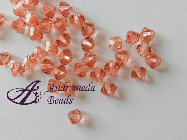 10 Cristalli Swarovski bicono 5328 4mm Rose Peach