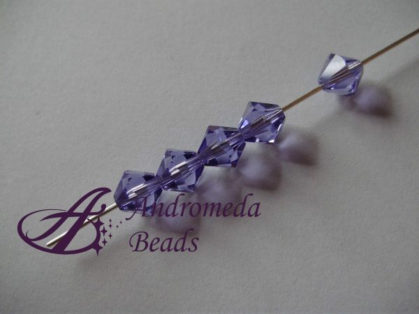5 Cristalli Swarovski bicono 5328 6mm Tanzanite - immagine 2