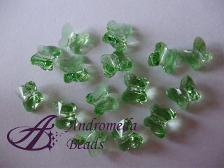 2 Cristalli Swarovski Farfalla 5754 6mm Peridot