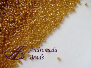 Miyuki Delica 11/0 colore 272 Lined Topaz Yellow AB 5g