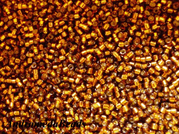 Miyuki Delica 11/0 colore 612 Silver Lined Dark Topaz 5g