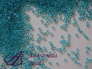 Miyuki Rocailles 15/0 colore 1555 Sparkling Teal Lined Crystal 5g